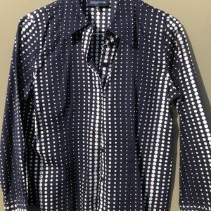 Long-sleeved  button down shirt.